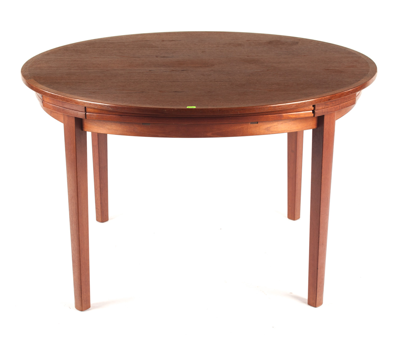 Appraisal: Dyrlund Danish teakwood circular dining table with retractable hinged semi-circular