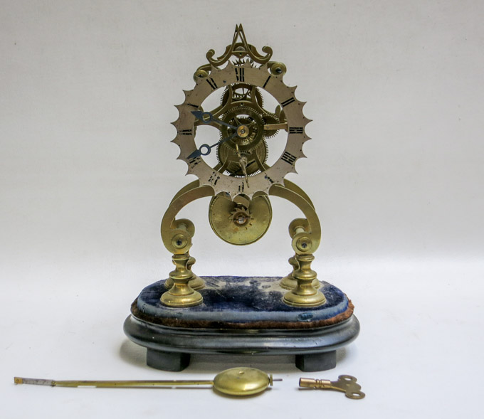 Appraisal: FUSEE SKELETON CLOCK English th century the brass clock attached