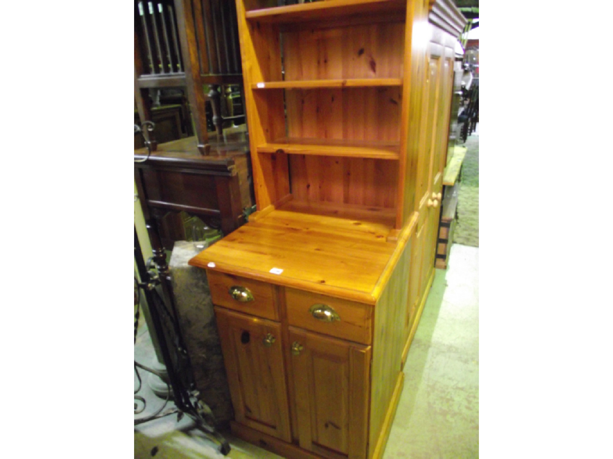 Appraisal: A small pine dresser the base enclosed by two drawers