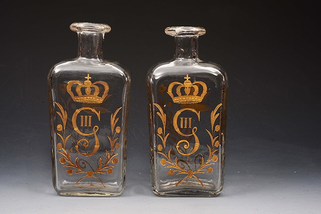 Appraisal: A PAIR OF EARLY TH CENTURY GLASS SPIRIT DECANTERS of