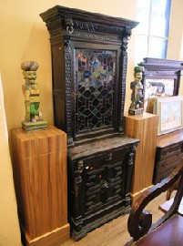 Appraisal: TUDOR STYLE OAK BOOKCASE WITH LEADLIGHT DOOR