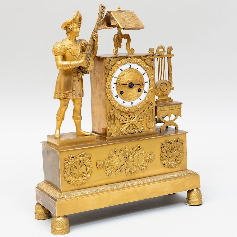 Appraisal: Empire Ormolu Mantel Clock With a musician music stand lyre