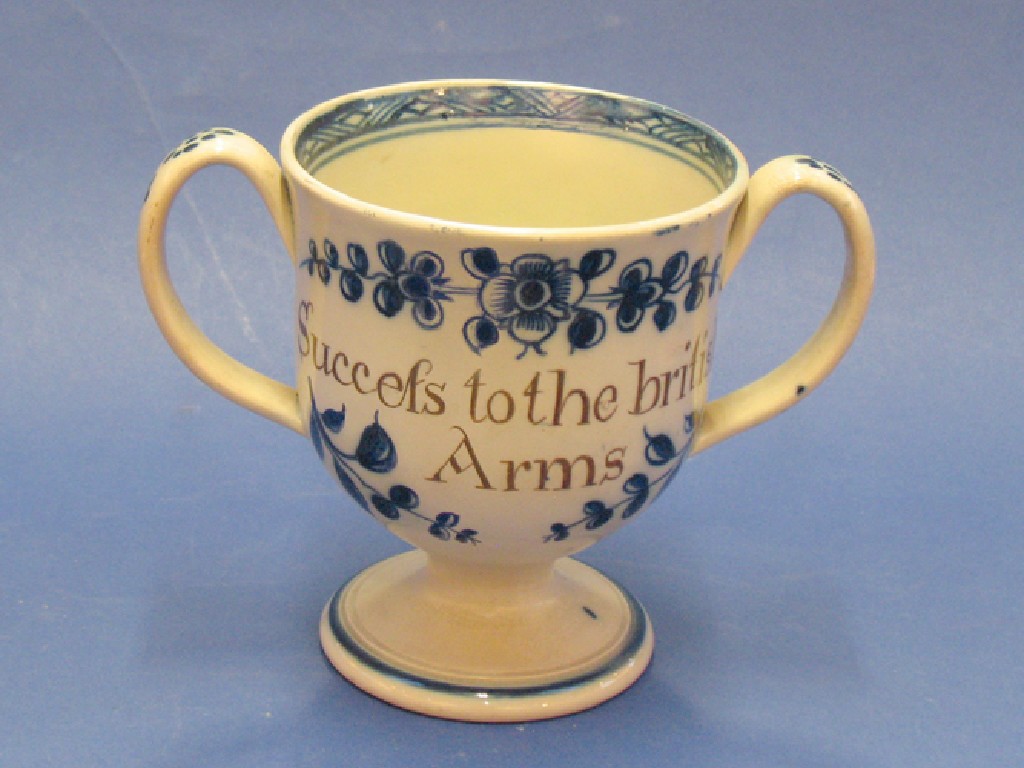 Appraisal: AN TH CENTURY PEARLWARE LOVING CUP with twin loop handles