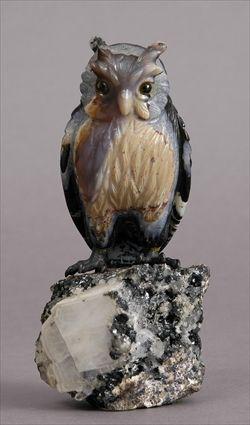 Appraisal: CARVED HARDSTONE FIGURE OF AN OWL ON SPECIMEN STAND Perched