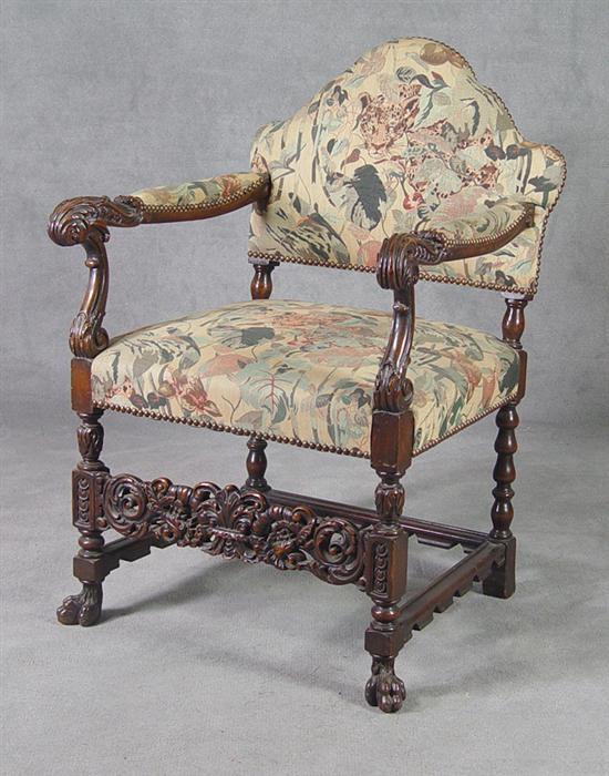 Appraisal: Carved Renaissance Revival Chair Turn-of-the-Century Carved arms and elaborately carved