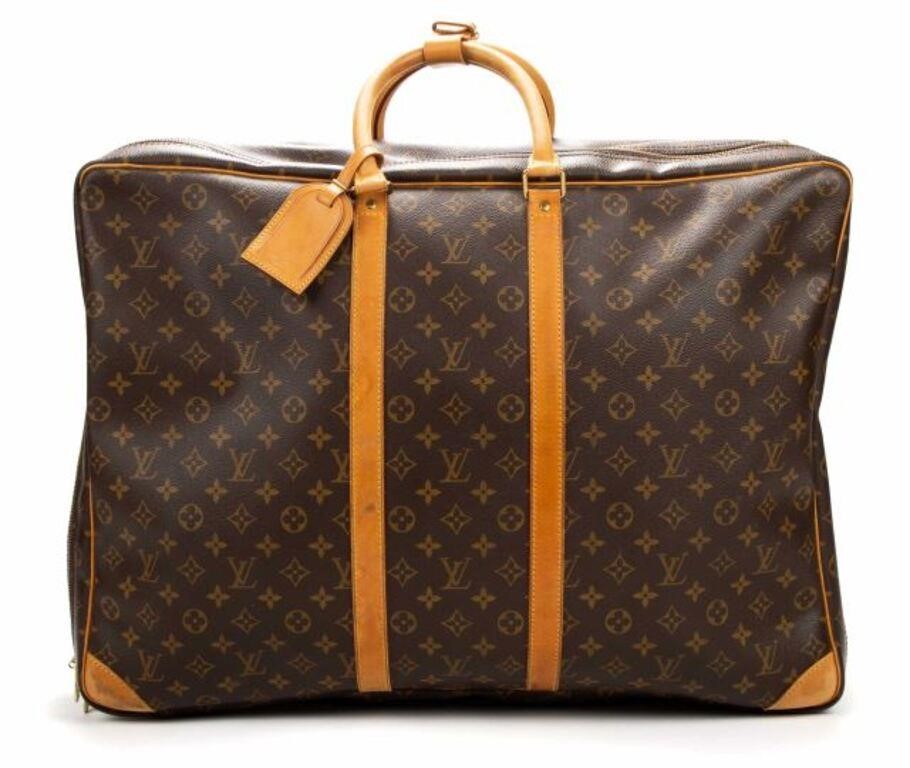 Appraisal: Louis Vuitton Sirius travel bag in brown monogram coated canvas