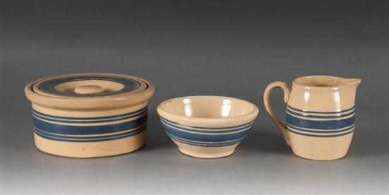 Appraisal: Blue banded yellow ware lidded butter tub and similar bowl