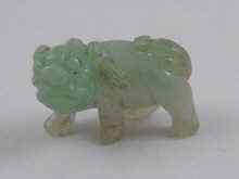 Appraisal: A Chinese jade carving of a temple dog cm long