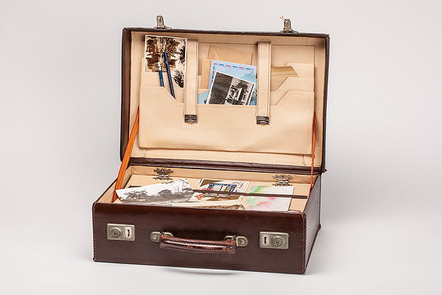 Appraisal: A s small travel suitcase or briefcase owned by Joyce