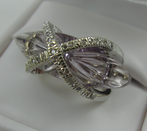 Appraisal: CONTEMPORARY AMETHYST AND DIAMOND RING the K white gold tower