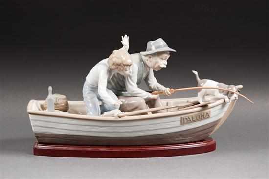 Appraisal: Lladro porcelain figural group ''Fishing with Gramps'' no modeled as