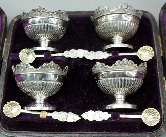 Appraisal: A cased sterling silver set of salt bowls and spoons