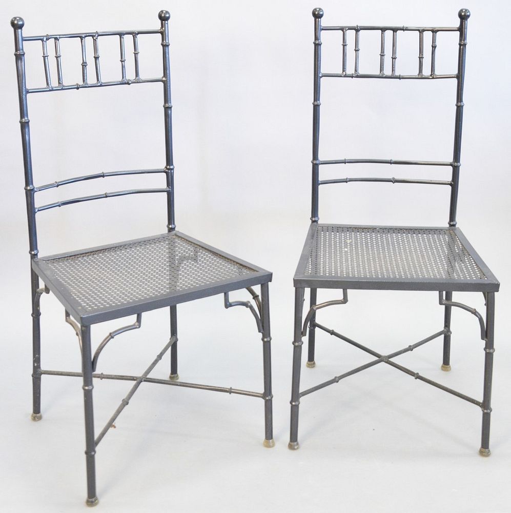 Appraisal: Black faux bamboo chairs powder coated metal X cross stretchers