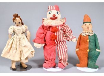 Appraisal: Three early felt and cloth dolls including a s cloth