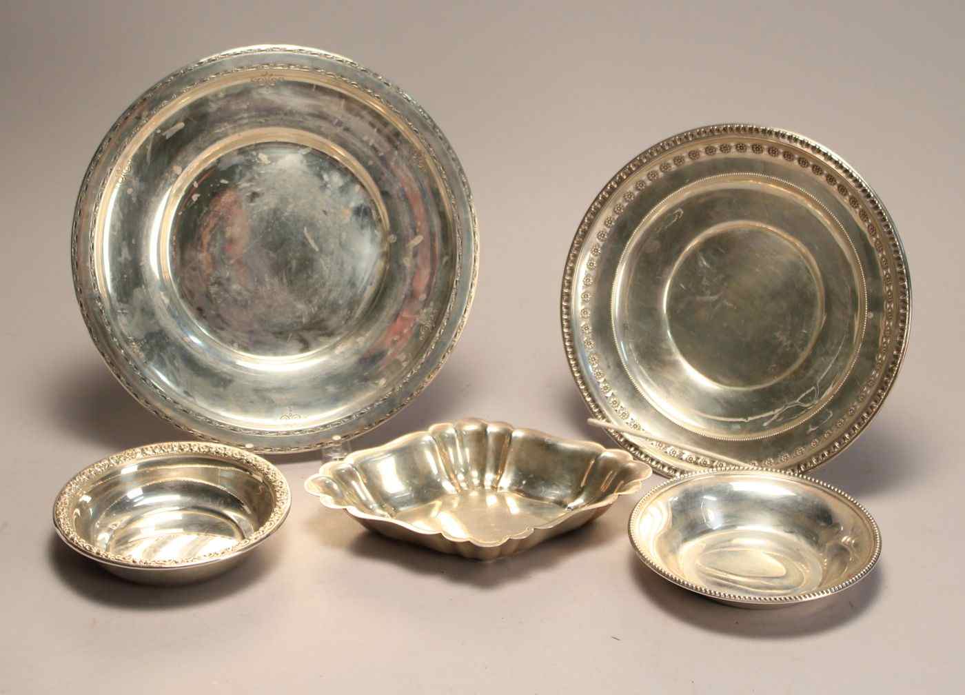 Appraisal: FIVE PIECES OF STERLING SILVER HOLLOWWAREBy various makers Includes a