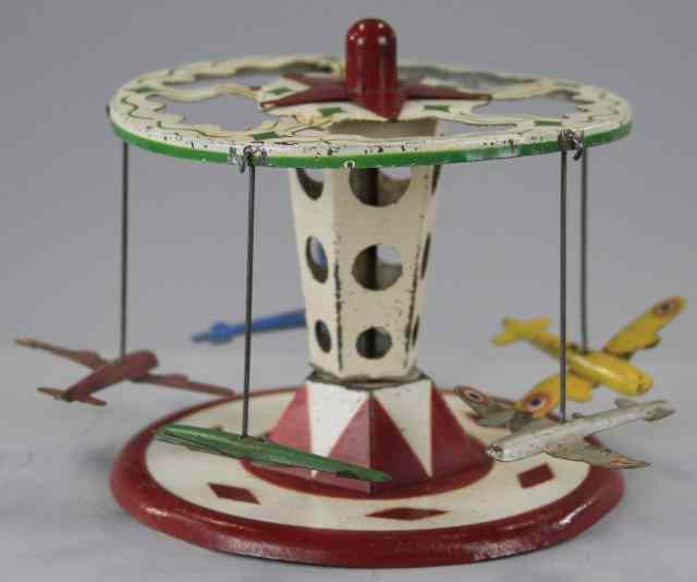 Appraisal: AIRPLANE ROUNDABOUT Germany tin carnival ride toy brightly painted in