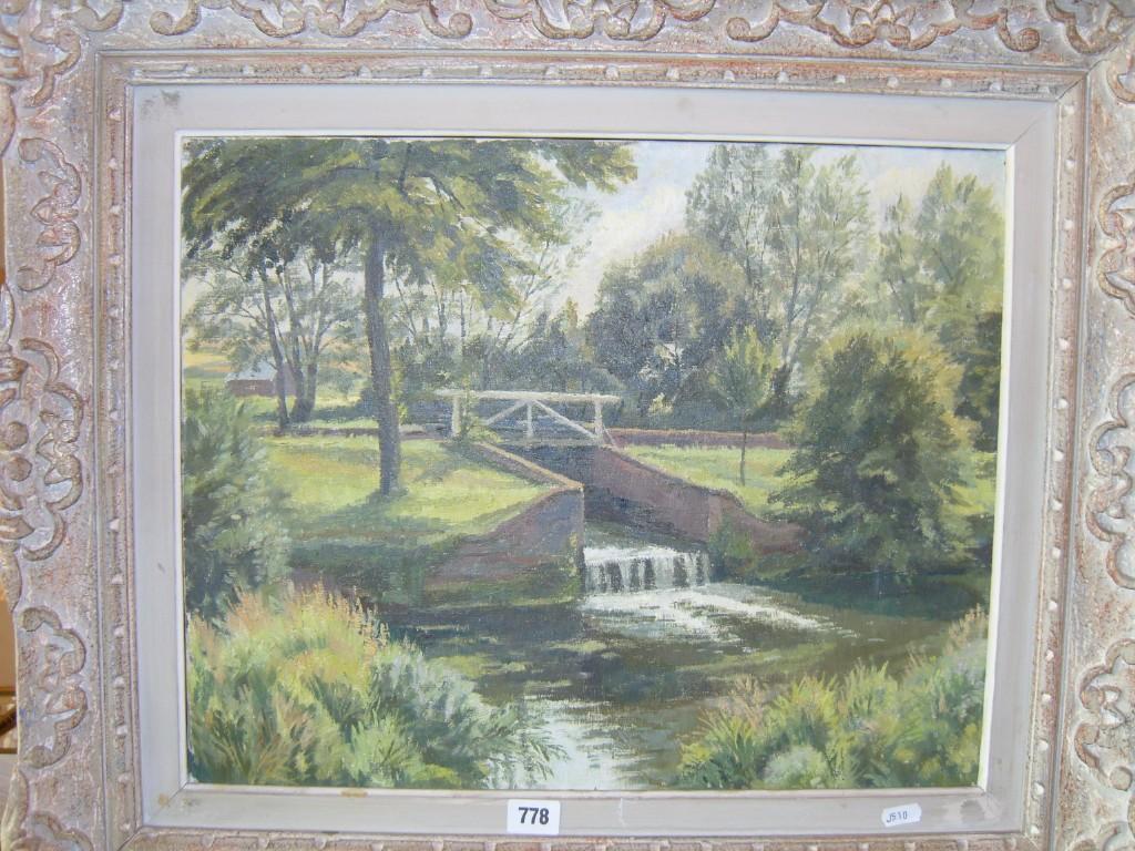 Appraisal: An oil painting on canvas of a landscape with canal