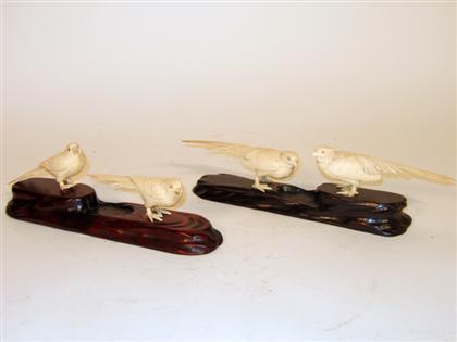 Appraisal: Two Japanese elephant ivory bird groupings Worked to show two