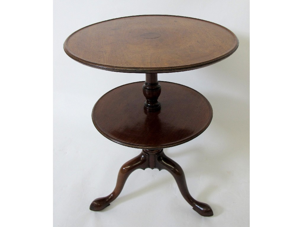 Appraisal: A George III mahogany circular two tier dumb waiter with