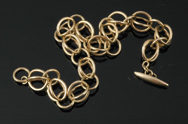 Appraisal: A GEORG JENSEN GOLD BRACELET Modelled in ct gold with