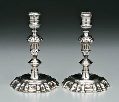 Appraisal: Pair George II candlesticks knopped baluster stems round stepped bases