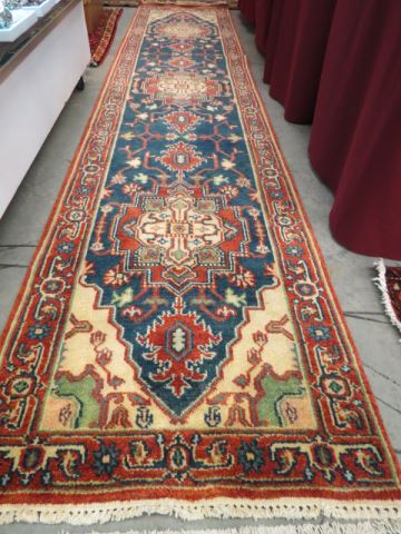 Appraisal: Serapi Persian Handmade Runner fancy geometric styles medallions soft earthtones