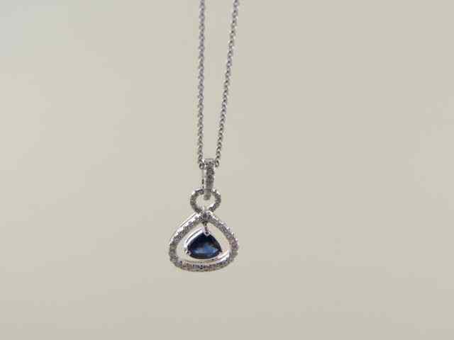 Appraisal: Sapphire Diamond Pendant carat rich blue gem surrounded by diamonds