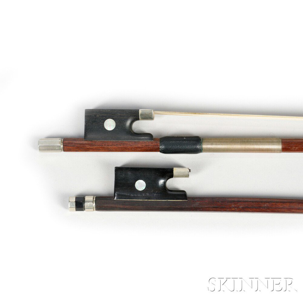 Appraisal: Two Violin Bows a -size nickel-mounted bow the round stick