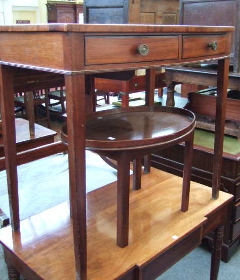 Appraisal: A late th century mahogany bow front side table with