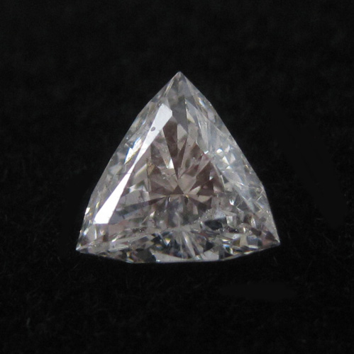 Appraisal: UNSET DIAMOND WITH GIA DIAMOND REPORT The modified triangular brilliant-cut