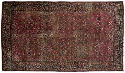 Appraisal: Finely woven Sarouk rug repeating floral and leaf designs on