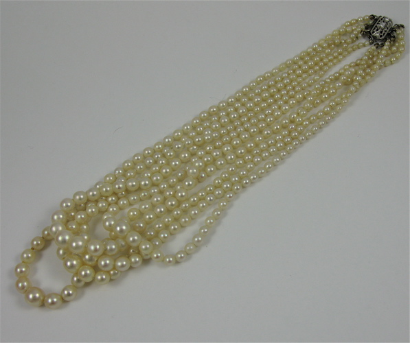 Appraisal: A FIVE STRAND PEARL NECKLACE WITH APPRAISAL strung with graduated