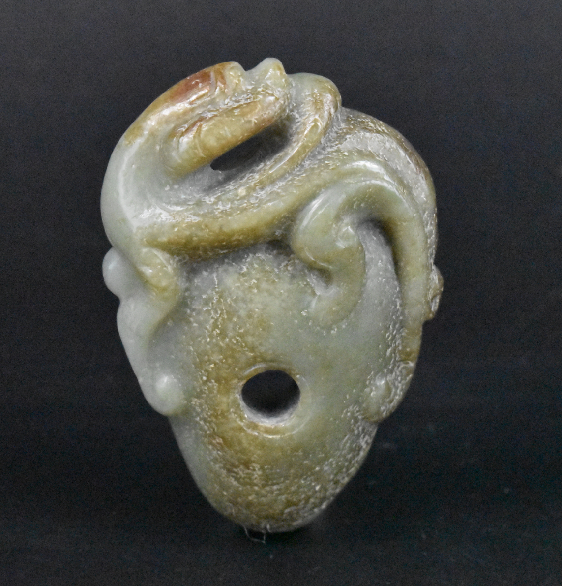 Appraisal: A Chinese jade carving toggle with Chi Dragon dating from