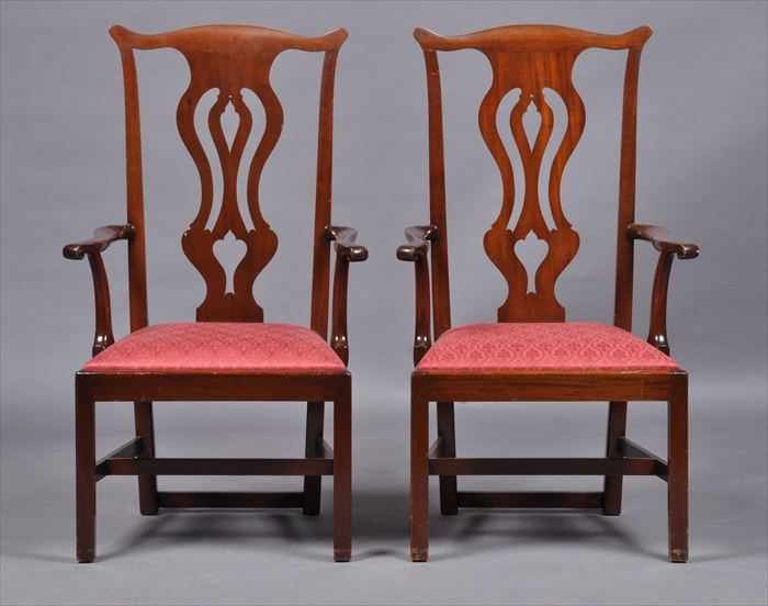 Appraisal: PAIR OF CHIPPENDALE-STYLE CARVED MAHOGANY LARGE ARMCHAIRS Each serpentine top