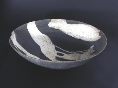 Appraisal: An early Martin Smith raku bowl circular with pinched rim