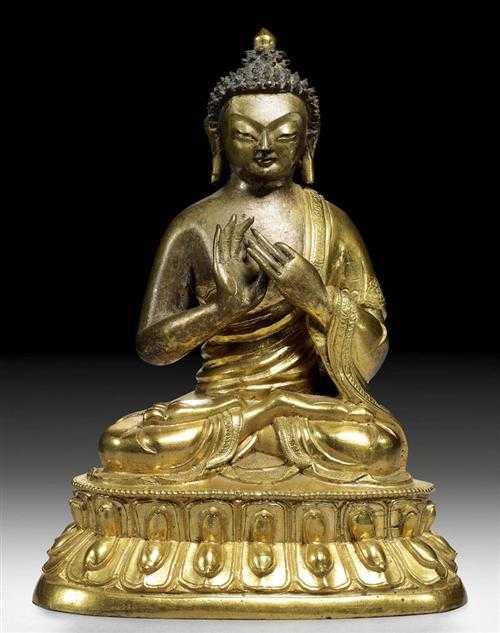 Appraisal: VAIROCANA Sino-Tibetan th century H cm Parcel-gilt bronze with remains