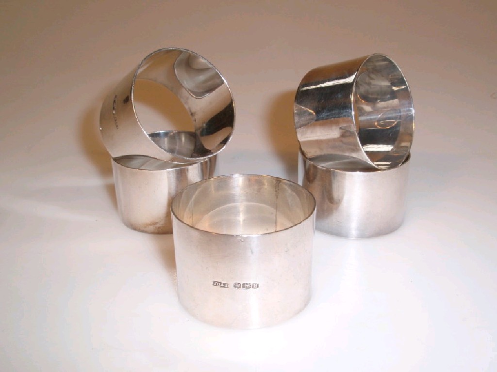 Appraisal: Five silver napkin rings of plain design various dates and