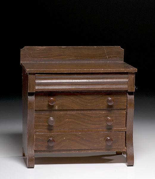 Appraisal: MINIATURE GRAIN-PAINTED CHEST OF DRAWERS American ca of grained pine