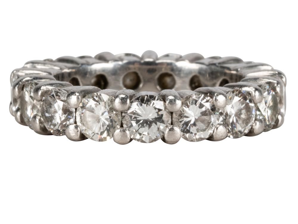 Appraisal: PLATINUM DIAMOND ETERNITY BANDcontaining round brilliant cut diamonds H-I VS