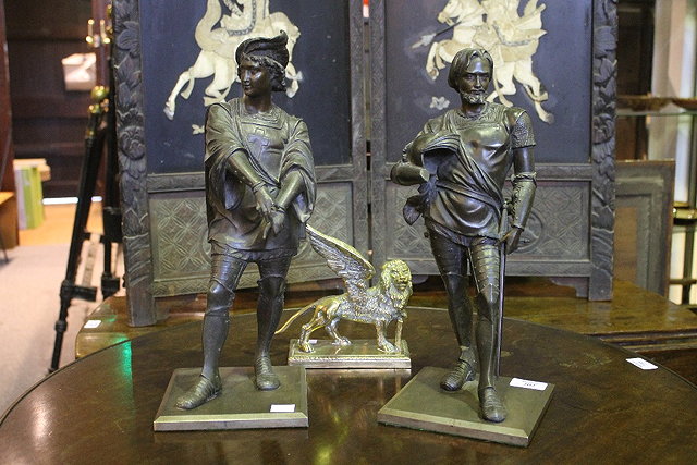 Appraisal: A PAIR OF VICTORIAN SPELTER KNIGHTS cm and a brass