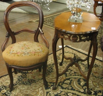 Appraisal: BALLOON-BACK SIDE CHAIR AND A MAHOGANY LAMP TABLE The Victorian