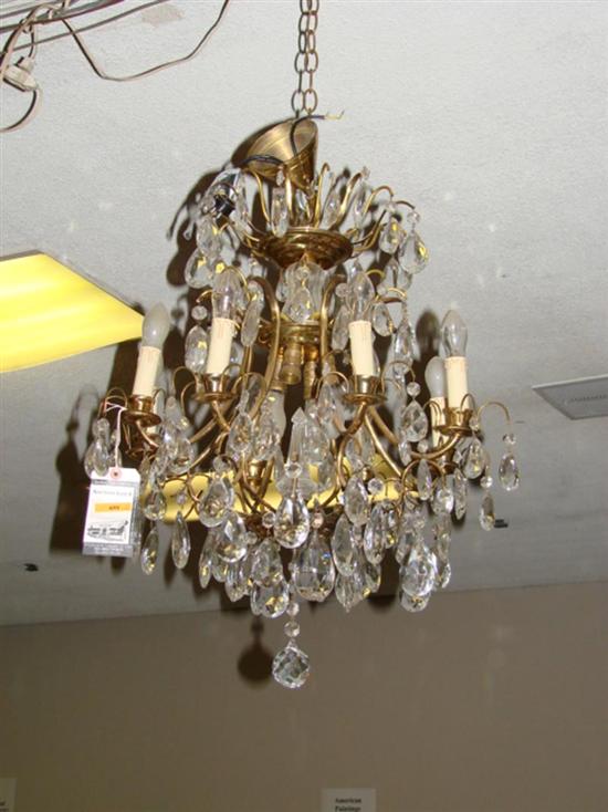 Appraisal: Gilt-metal and crystal chandelier first half th century scrolling arms