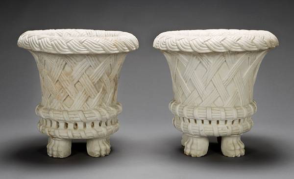 Appraisal: A pair of Neoclassical style white marble basket form jardinieres