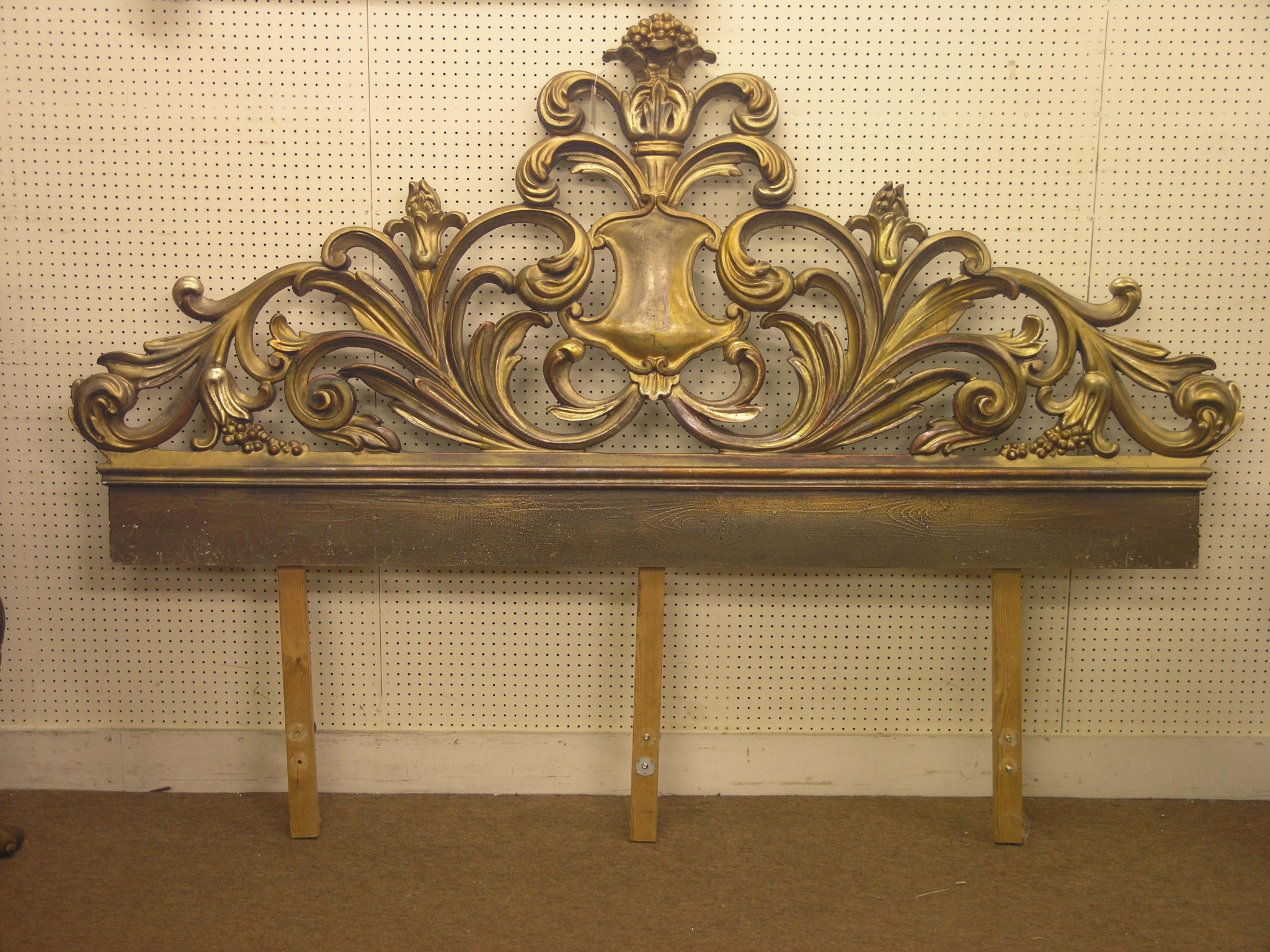 Appraisal: A decorative moulded gilt bed headboard double-size Louis XV leaf-scroll