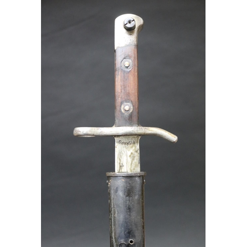 Appraisal: Finnish Model Army bayonet and scabbard Kiesling An excellent example