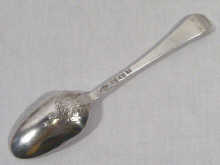 Appraisal: A shell and scroll back Hanoverian table spoon hallmarked London