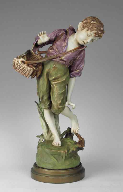 Appraisal: AMPHORA TYPE PORCELAIN FIGURE OF A YOUNG BOY Lobster at