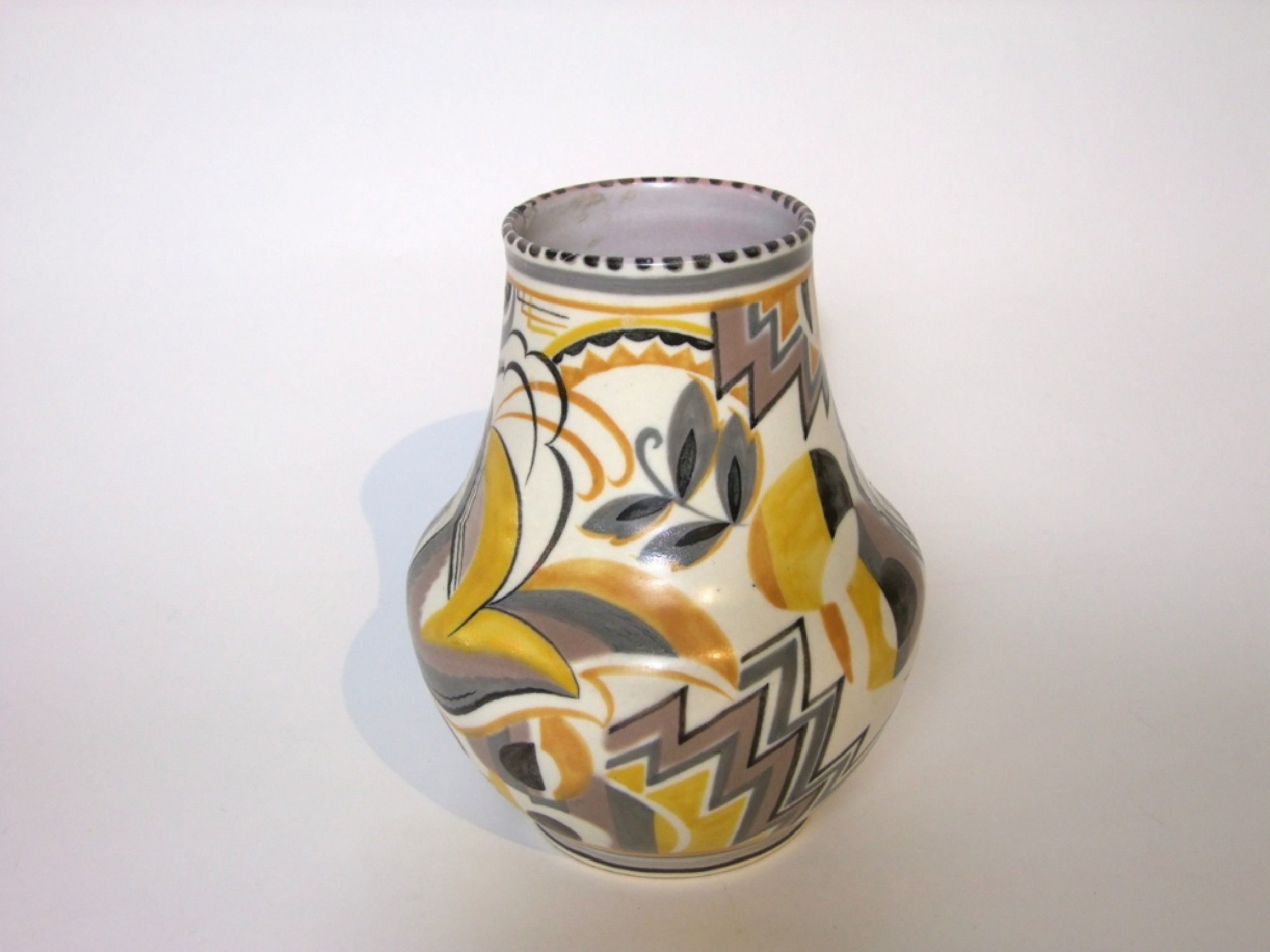 Appraisal: A Poole Pottery Art Deco vase with painted geometric and