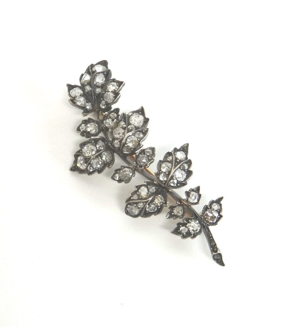 Appraisal: A Victorian diamond set brooch designed as a foliate spray