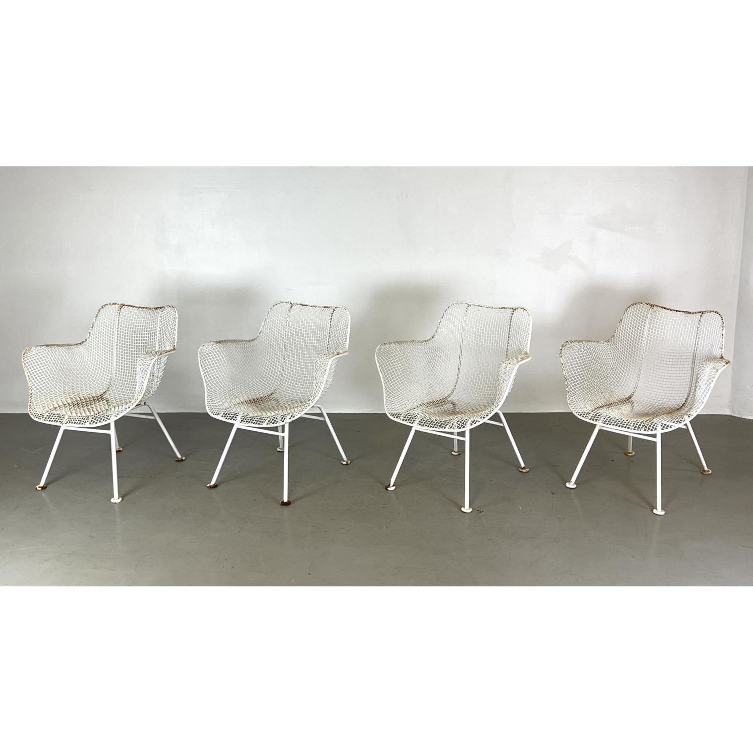 Appraisal: Set RUSSELL WOODARD Sculptura Lounge Chairs Painted White Metal Mesh